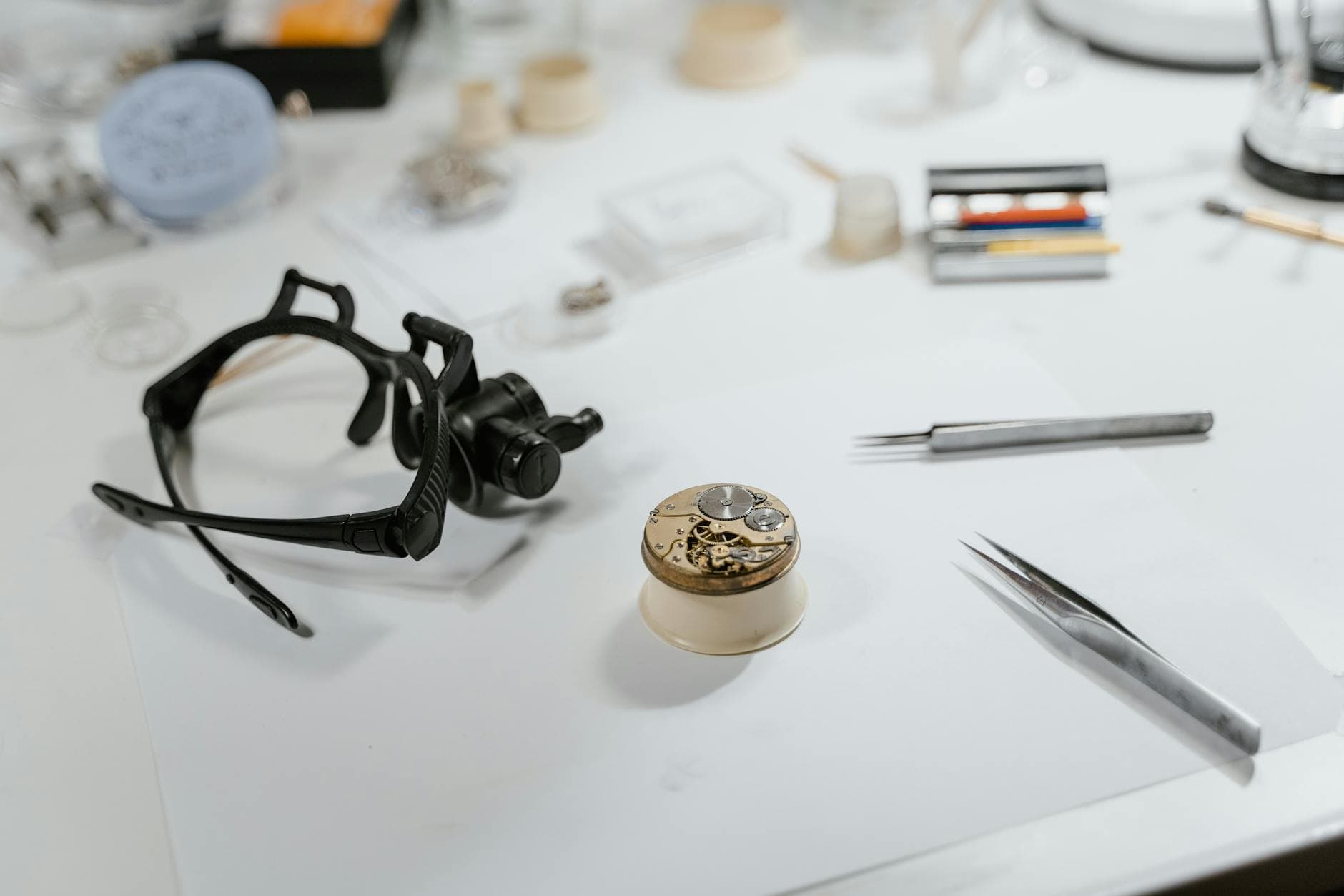 Jeweler repairing a watch with tools